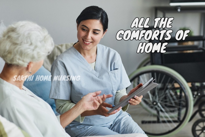 Sakthi Home Nursing Service nurse discussing healthcare plans with an elderly patient at home in Coimbatore, exemplifying the personalized and comfortable home care services provided.