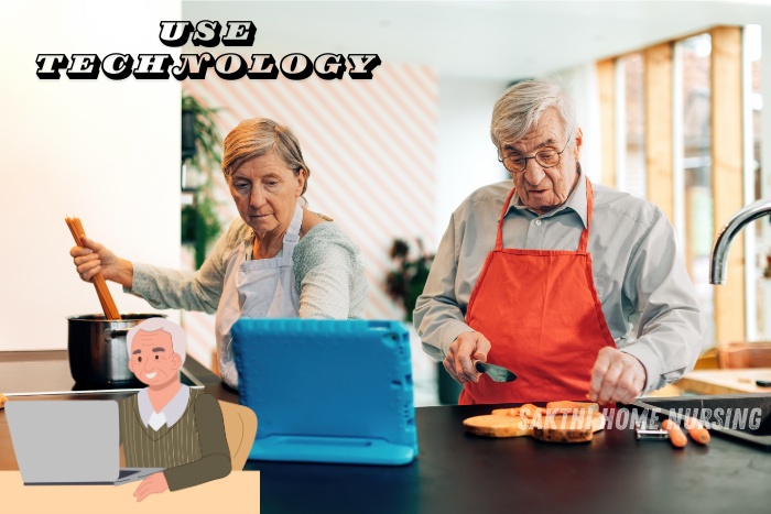 Elderly couple using technology to follow cooking instructions in the kitchen, supported by Sakthi Home Nursing Service in Coimbatore