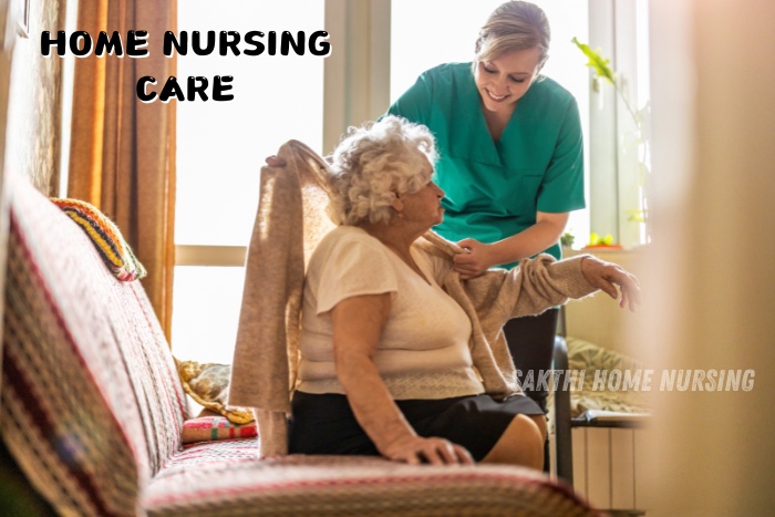 Home nursing care services by Sakthi Home Nursing Service in Coimbatore. Caring caregiver assisting an elderly woman at home, offering compassionate support and personalized care for seniors